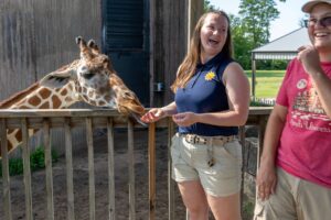 Friends University Partnership with Sedgwick County Zoo - Feeding the Girafee